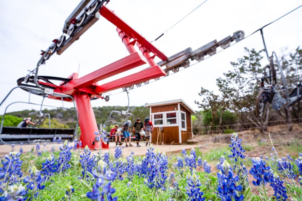 Bluebonnets in front of the only chairlift in Texas